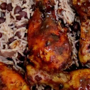 Jerk, legs and red peas, and rice