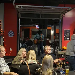 a group of people sitting around a table