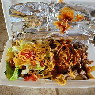 Soul fries with pulled pork and taco meat