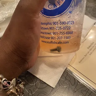 The cup with the screw in the bottom.