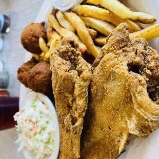 Whole catfish with coleslaw, fries and hush puppies