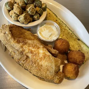 Whole catfish okra hush puppies grilled zucchini tarter sauce