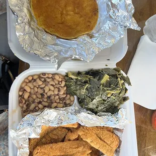Corn bread, red snapper, greens and black eyed peas. Good