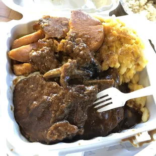 a meal in a styrofoam container