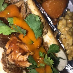 a sandwich with meat and vegetables