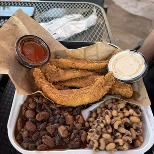 Fried Catfish with Turkey Chili Beans and Black Eyed Peas. Not pictured the Fried Cabbage