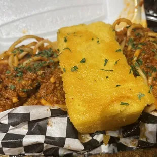 a meal in a styrofoam container