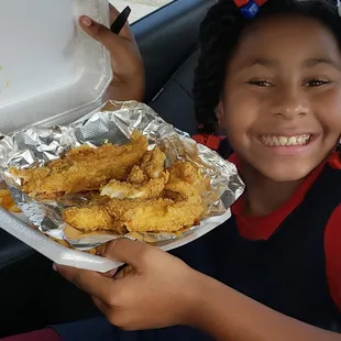 Fresh, 4real, no Fishy-smell! Catfish in the plate my Granddaughter is Holding!
