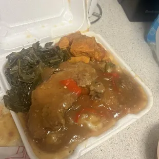 Smothered Porkchops Mashed Potatoes Candied Yams and Collard Greens!