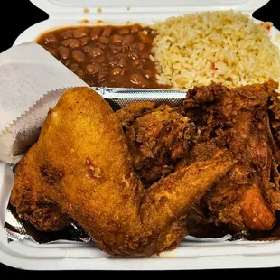 2 piece fried chicken, beans, rice and Cornbread.