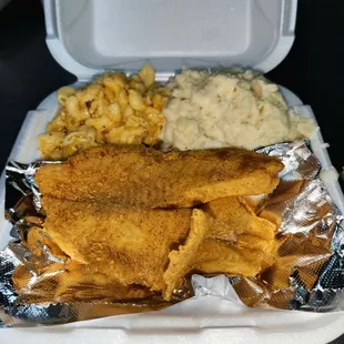 Fried TILAPIA with Mac and cheese,  mashed Potatoes.
