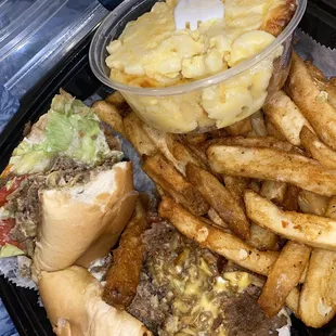 Cheesesteak with a side of Mac . Soooo good