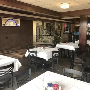 a restaurant with tables and chairs