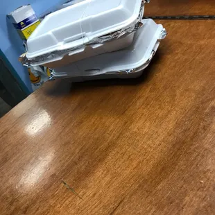 a table with two trays of food on it