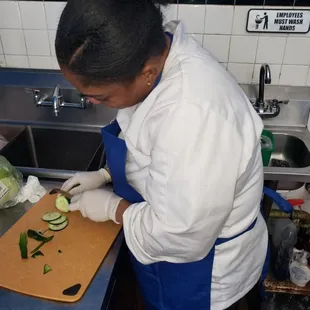 Ms D preparing fresh salad