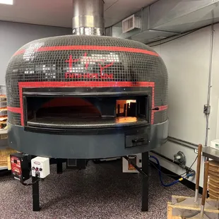 a pizza oven in a kitchen