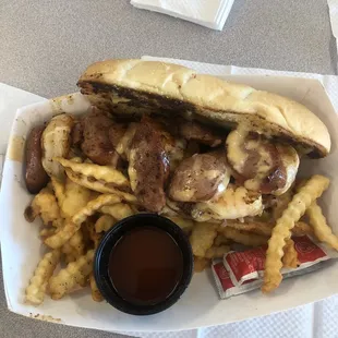 Shrimp and sausage po boy with fries included