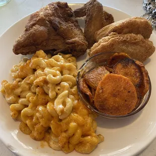 2 pc fried chicken, 2 pc corn bread, yams and mac and cheese.