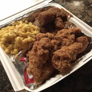 Fried chicken, macaroni and cheese, and yams.