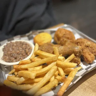 Another 3- Piece Fried Chicken Dark Meat with black eyed peas and fries