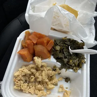 a meal in a styrofoam container