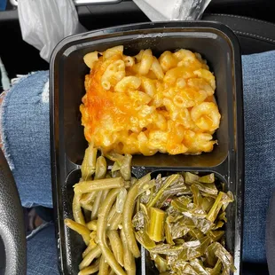 macaroni and cheese and green beans in a plastic container