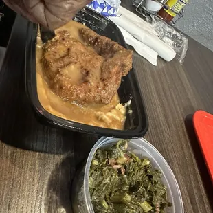 Smothered pork chop and greens. The greens were good.