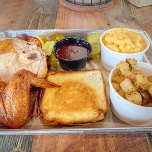 Chicken, spicy sausage, brisket, Mac n cheese, potatoes