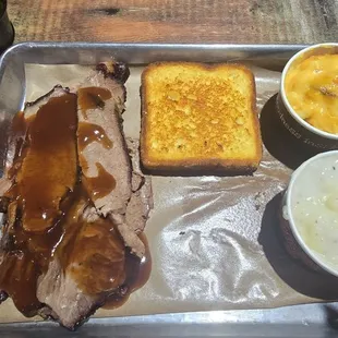 Brisket, mashed potatoes, mac and cheese.