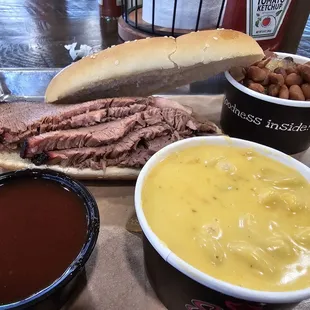 Sandwich Plate $14.50 Served on a 6" hoagie bun with your choice of meat. Includes 2 sides.