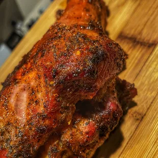 a whole chicken on a cutting board