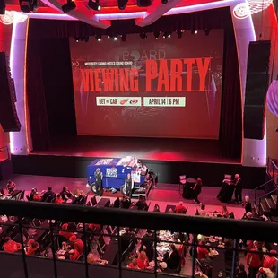 a stage with a crowd of people