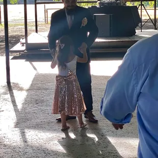 This is me and my daughter for the father daughter dance and Taylor in the background doing an amazing job thank you again.
