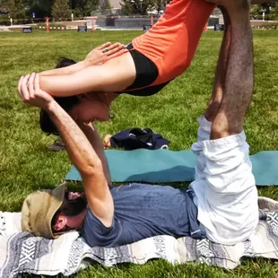 Acro Yoga students in the park led yearly by SMY instructors