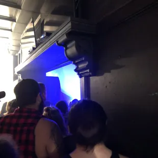 The venue was so overcrowded that this was my view. A wall that blocked the view of the stage.