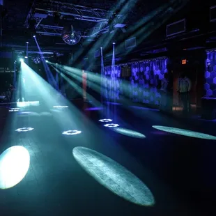 a room with a lot of light coming from the ceiling