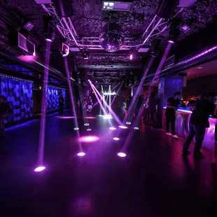 a group of people in a dark room