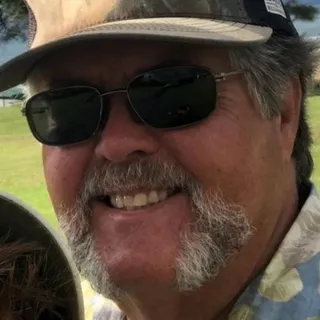 Dennis T.