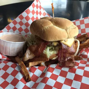 Single bacon cheeseburger. With fry sauce and home cut fries.