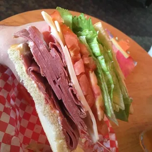 Served with a smile!!! $6.75 - sandwich/ slaw/ soft drink- cannot beat it!! Thank you!