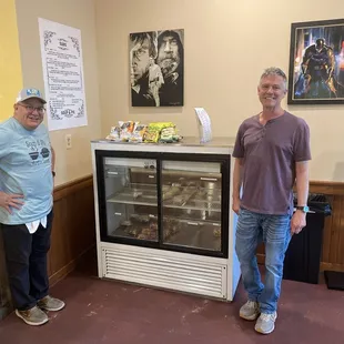 Evening server and one of the owners after I purchased 15 pie slices, and thinned down the number of leftover pies!