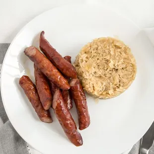 Sausage plate #1. Stewed sauerkraut with smoked kabanosy sausages.