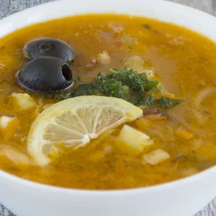 Solyanka soup based on smoked sausages and bacon.