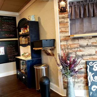 a brick wall with a menu on it