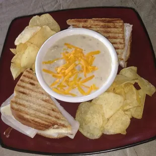 Homemade potato soup with grilled turkey and swiss panini