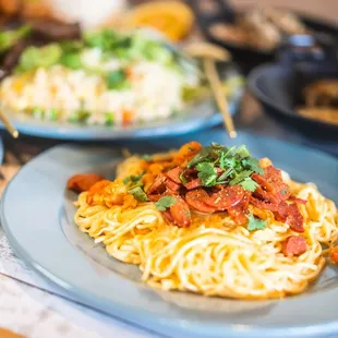 three plates of food on a table