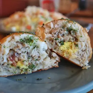 a half eaten sandwich on a plate