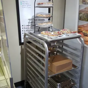 a display of food items in a bakery