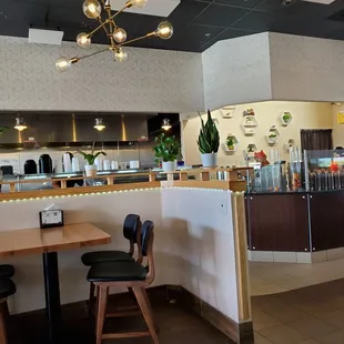 a view of the kitchen and dining area
