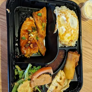 a meal in a styrofoam container